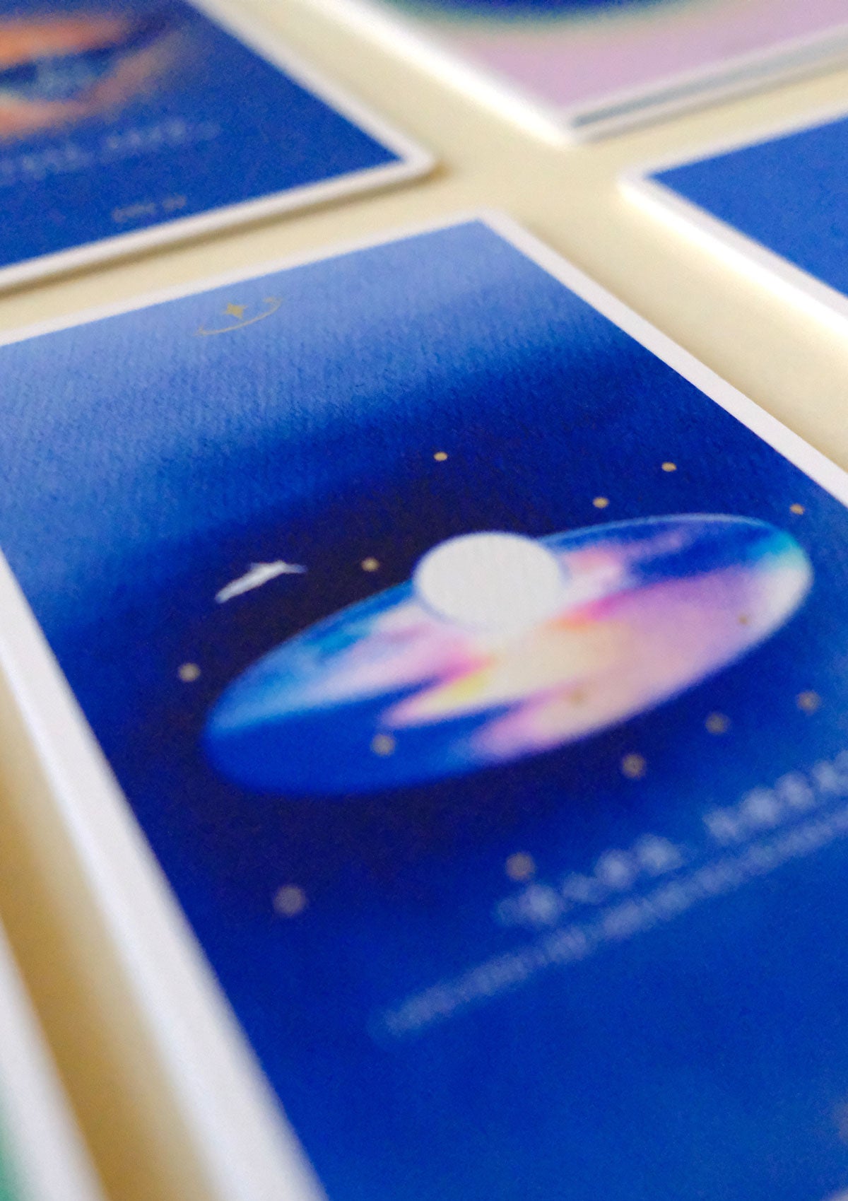 Close-up showing the color and print texture of a Cosmic Echo card