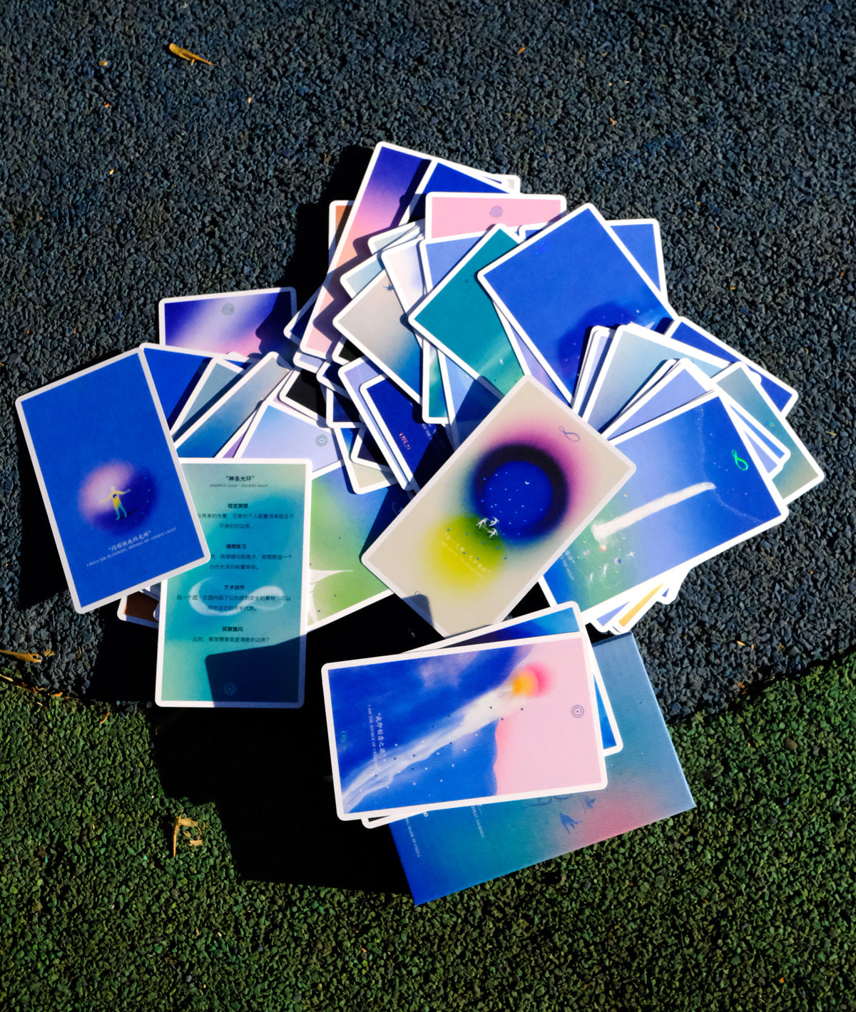 A wide spread of colorful Cosmic Echo art cards